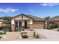 Single-story home with a two-car garage and desert landscaping at 7632 W Minton St, Laveen, AZ 85339