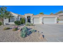 Single-story home with two-car garage and desert landscaping at 6344 W Tether Trail Trl, Phoenix, AZ 85083