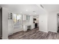 Bright kitchen features white cabinets, stainless steel appliances, and quartz countertops at 7402 E Carefree Dr # 319, Carefree, AZ 85377