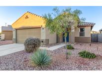 One-story house with desert landscaping and a two-car garage at 21612 W Kimberly Dr, Buckeye, AZ 85326