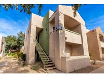 Two story building exterior with a stairway leading to the entrance at 1295 N Ash St # 625, Gilbert, AZ 85233