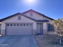 Single-story house with a two-car garage and neutral color scheme at 881 E Appaloosa Rd, Gilbert, AZ 85296