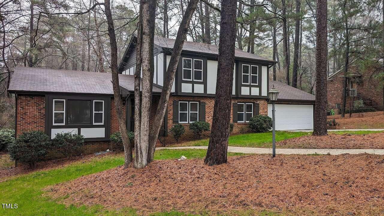 Photo one of 5008 Larchmont Dr Raleigh NC 27612 | MLS 10004367