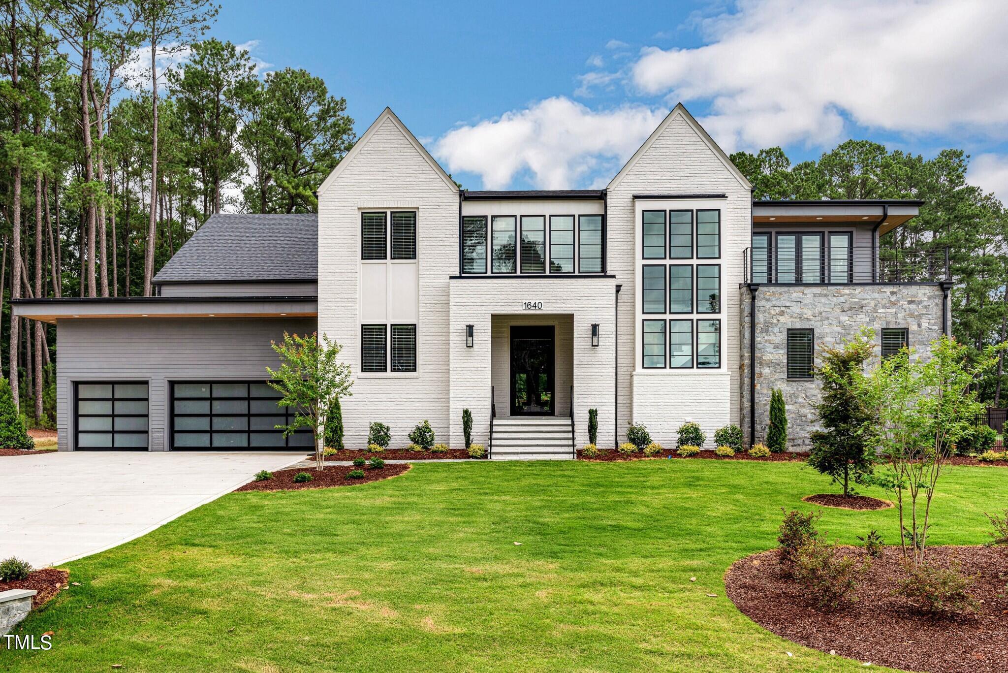 Photo one of 1640 Estate Valley Ln Raleigh NC 27613 | MLS 10014378
