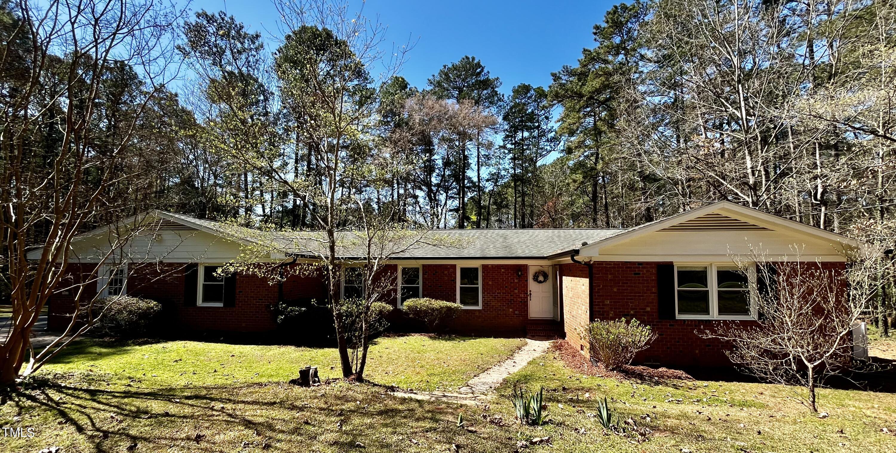 Photo one of 3111 Tanager St Raleigh NC 27606 | MLS 10018526