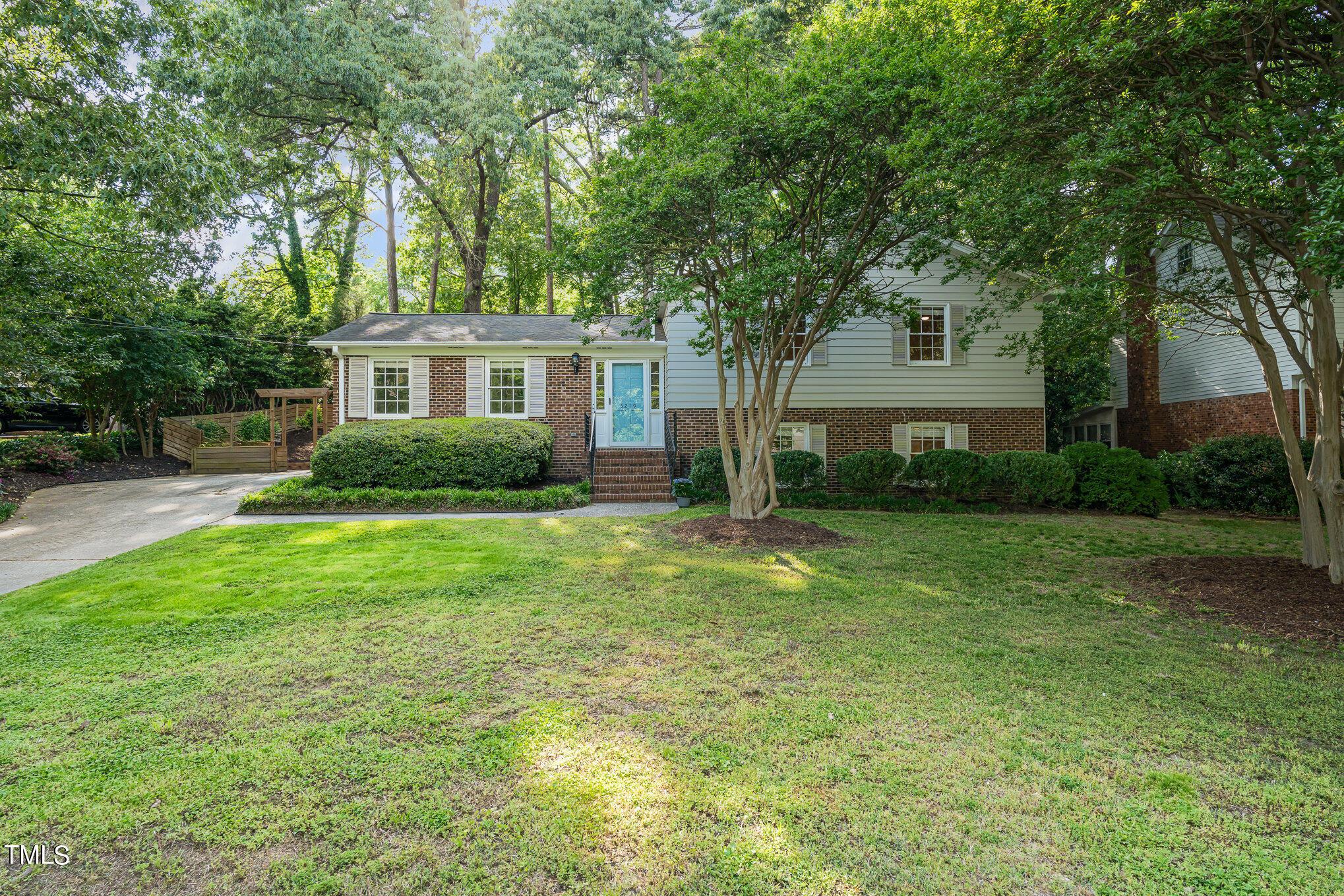 Photo one of 5219 Knollwood Rd Raleigh NC 27609 | MLS 10025084