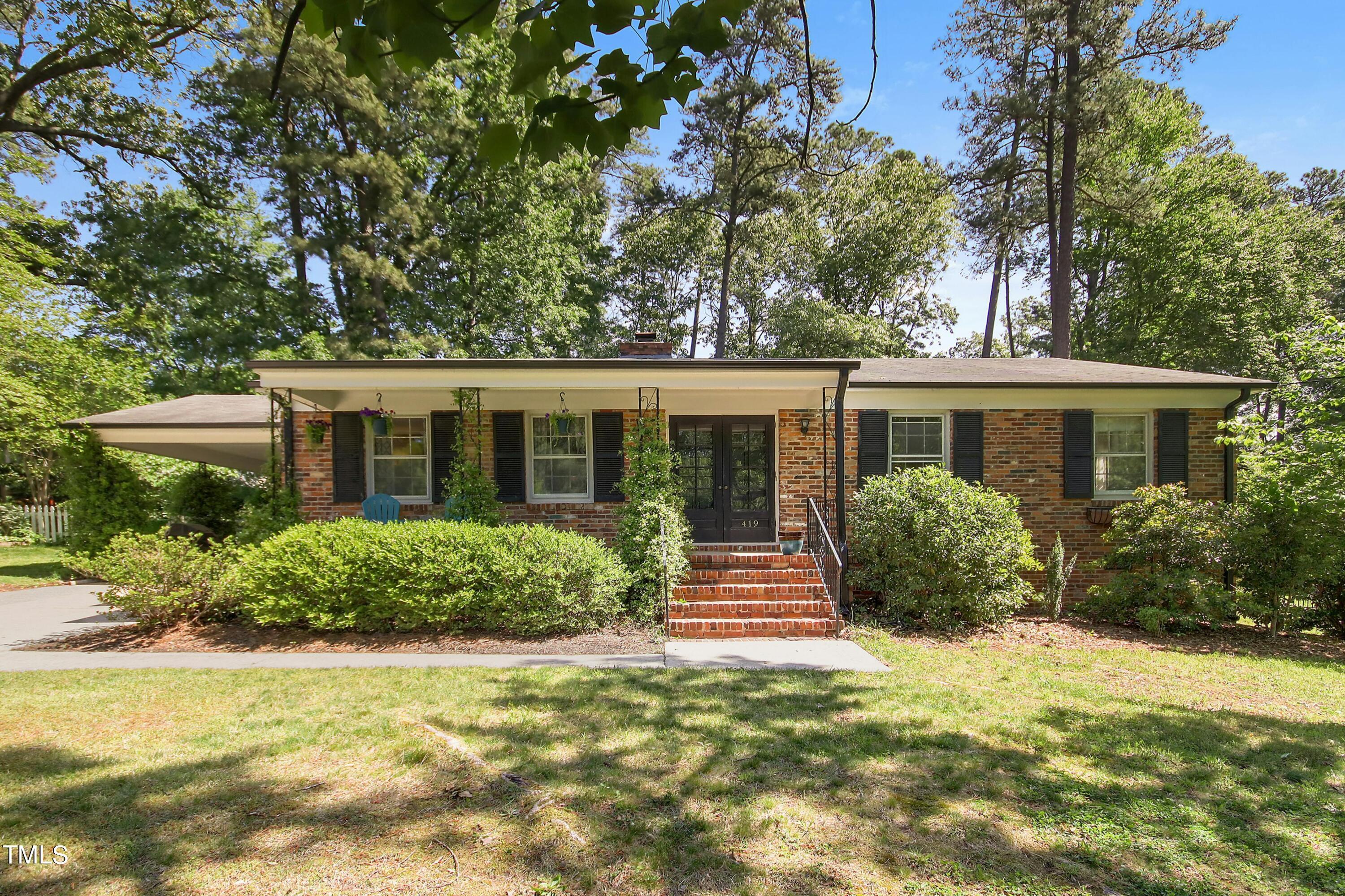 Photo one of 419 Emerson Dr Raleigh NC 27609 | MLS 10025211