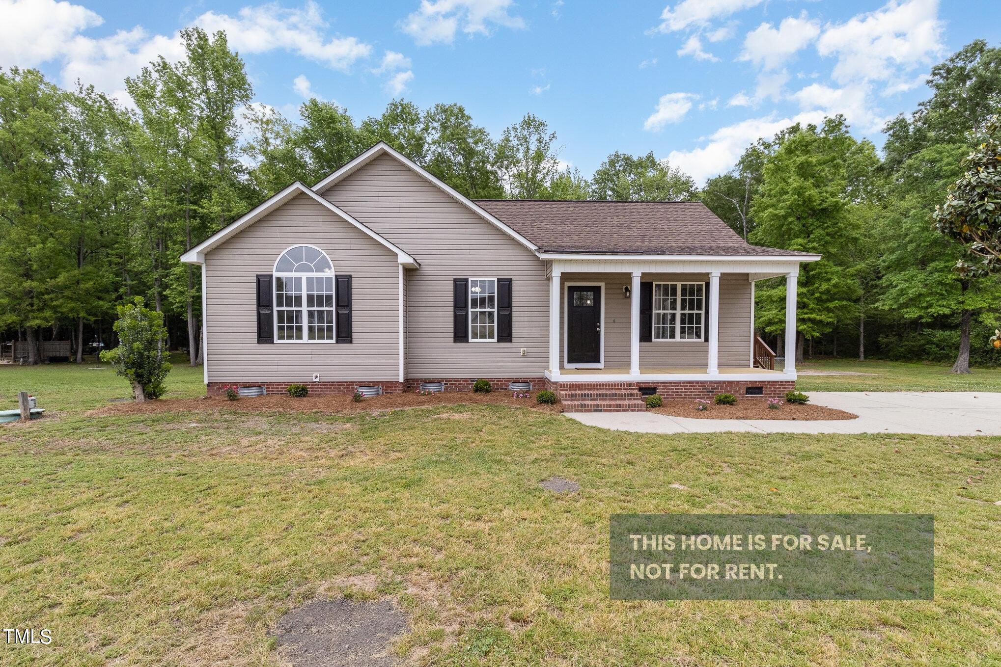 Photo one of 59 S Fred Cir Kenly NC 27542 | MLS 10025485