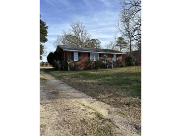 Photo one of 106 Pearces Rd Zebulon NC 27597 | MLS 10002374