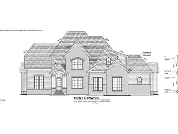 Front elevation of two story home with gray roof at 62 Peddler Mill Way, Pittsboro, NC 27312
