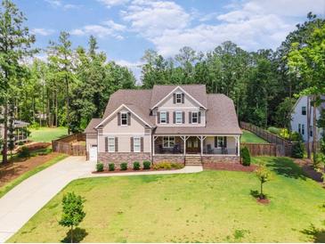 Photo one of 209 Holbrook Hill Ln Holly Springs NC 27540 | MLS 10008024