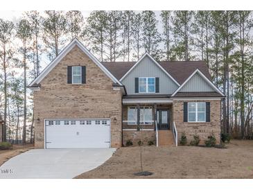 Photo one of 184 Dereham Ln Garner NC 27529 | MLS 10010044