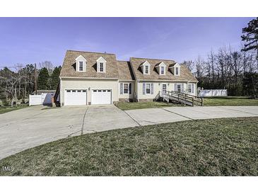 Photo one of 1516 Pearces Rd Zebulon NC 27597 | MLS 10010381