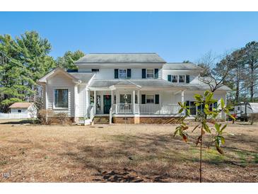 Photo one of 5509 Huntingwood Dr Raleigh NC 27606 | MLS 10012705