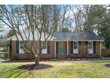 Photo one of 5221 Sedgefield Dr Raleigh NC 27609 | MLS 10014500