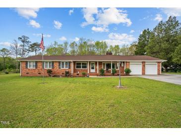 Photo one of 33 Government Rd Clayton NC 27520 | MLS 10021408