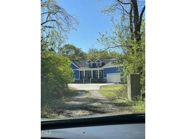 Photo one of 105 Stagecoach Lane Coats NC 27521 | MLS 10021659