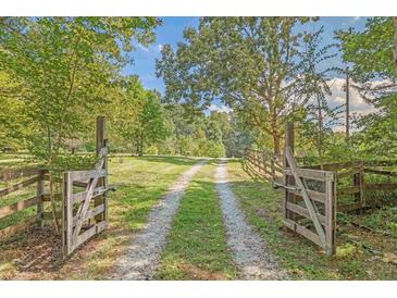 Photo one of 1907 Old Red Mountain Rd Rougemont NC 27572 | MLS 10022048