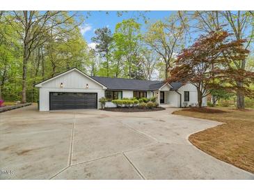 Photo one of 105 Glasgow Rd Cary NC 27511 | MLS 10022292