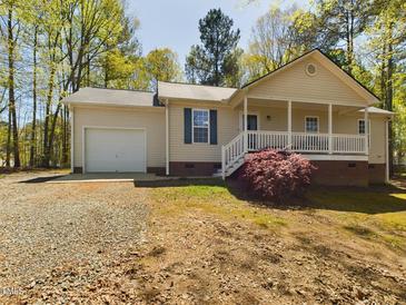 Photo one of 328 Little River Dr Zebulon NC 27597 | MLS 10022653