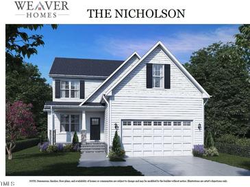 Two story home with white siding, gray shutters, and a two-car garage at 53 Hillwood Dr, Sanford, NC 27332