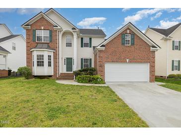 Photo one of 5628 Beargrass Ln Raleigh NC 27616 | MLS 10023017