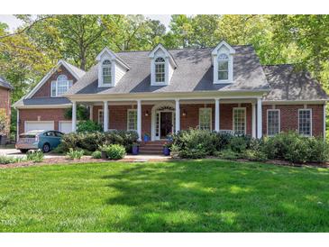 Photo one of 300 Bordeaux Ln Cary NC 27511 | MLS 10023512