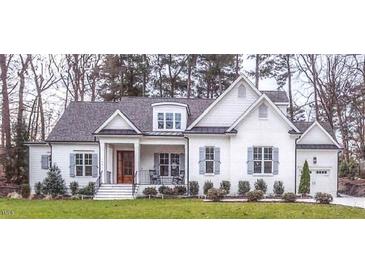 Photo one of 5308 Parkwood Dr Raleigh NC 27612 | MLS 10024116