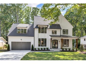 Photo one of 408 Chadwick Dr Raleigh NC 27609 | MLS 10024188