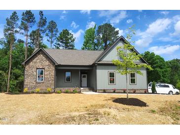 Photo one of 15 Satinwing Ct Youngsville NC 27596 | MLS 10024208