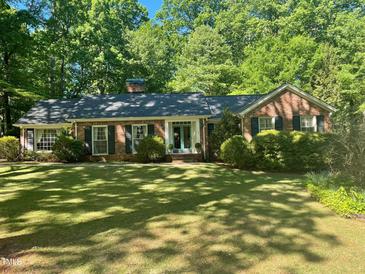 Photo one of 409 Holly Cir Cary NC 27511 | MLS 10024323