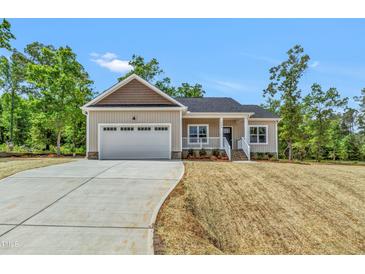 Photo one of 304 Dry Branch Dr Kenly NC 27542 | MLS 10025374