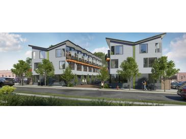Modern multi-unit building with gray siding and private balconies at 106 Broadway St # 207, Durham, NC 27701