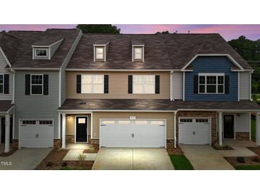 Three-unit townhome building; two-toned exterior at 818 Pryor St # 55, Mebane, NC 27302