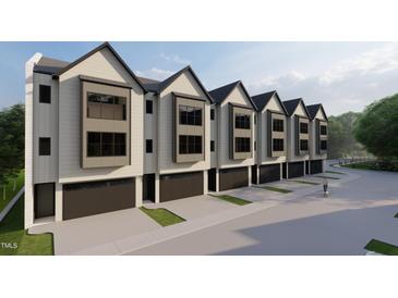 Modern townhome community with attached garages and sleek exterior design at 810 Maple Berry Ln # 106, Raleigh, NC 27607