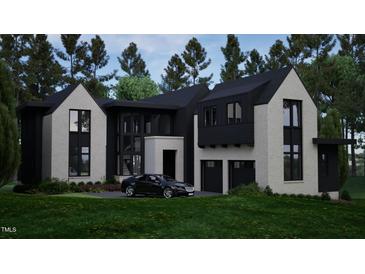Stunning two-story home boasts a modern design with black and white exterior at 2419 Medway Dr, Raleigh, NC 27608