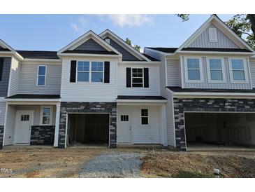 Photo one of 65 Fairwinds Dr Lillington NC 27546 | MLS 10034571