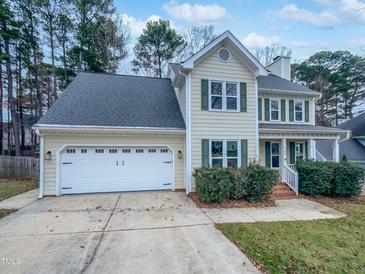 Two-story house with a two-car garage and landscaped yard at 508 Samara St, Apex, NC 27502