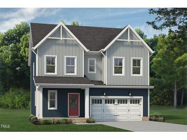 Two-story home with gray and blue siding, a red door, and a two-car garage at 213 Beacon Dr, Pittsboro, NC 27312