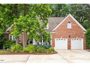 Photo one of 8764 Wildwood Links Raleigh NC 27613 | MLS 10034971