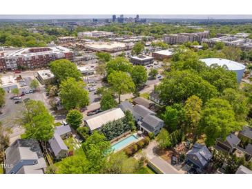 Aerial view showing home, pool, and surrounding neighborhood at 617 Tower St, Raleigh, NC 27607