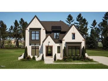 Two-story modern home with a stylish facade at 3709 Joyful Creek Trl, Zebulon, NC 27597