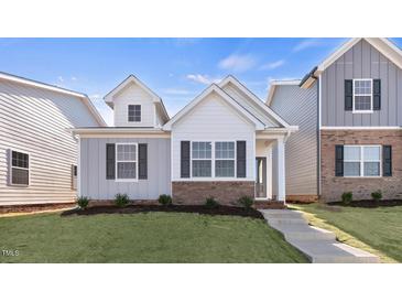 Modern two-story home with gray and white siding at 795 Washington St, Fuquay Varina, NC 27526