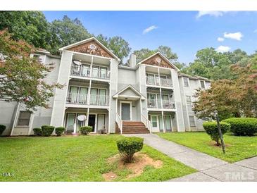 Three-story apartment building with balconies and landscaping at 1330 Park Glen Dr # 104, Raleigh, NC 27610