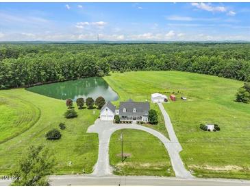 House with pond and large yard, beautiful scenery at 557 Olives Chapel Rd, Apex, NC 27502