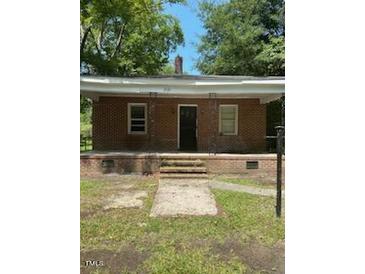 Brick house with a front porch and steps at 1222 Hargrove St, Rocky Mount, NC 27801