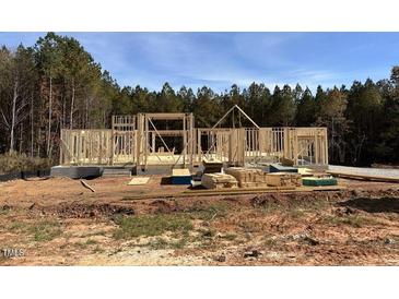 New home under construction, framing stage at 180 Cherry Bark Dr, Youngsville, NC 27596