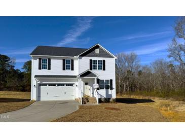 Two-story house with white siding, gray roof, and attached garage at 99 Mapledale Ct, Benson, NC 27504
