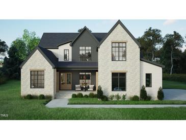 Two-story modern farmhouse with brick and siding exterior, welcoming porch, and attached garage at 3612 Bailey Meadows Drive Dr, Wake Forest, NC 27587