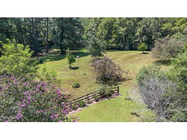 Spacious backyard with lush greenery at 9500 Ligon Mill Rd, Wake Forest, NC 27587